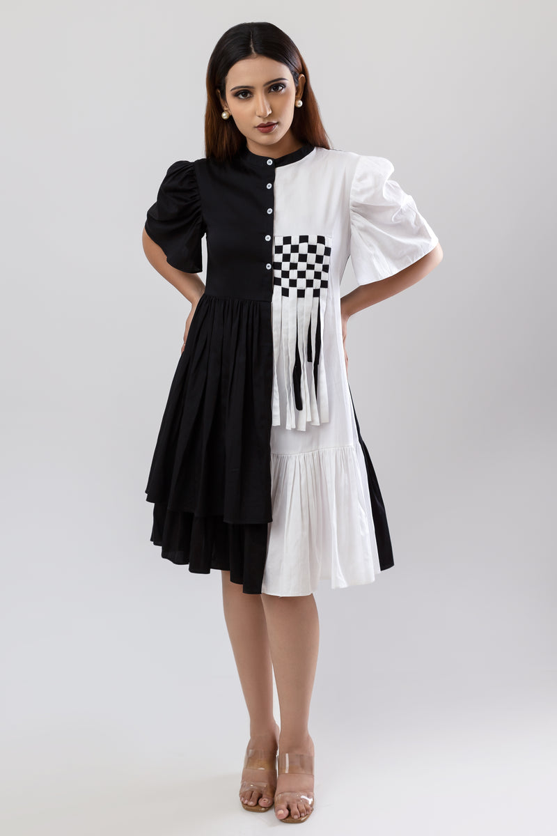 Pleated black and white dress