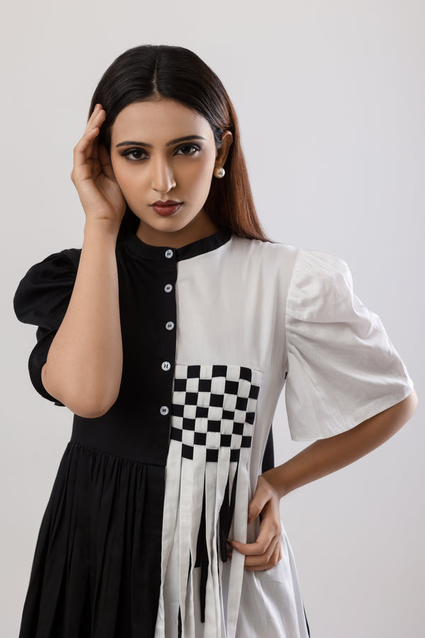 Pleated black and white dress